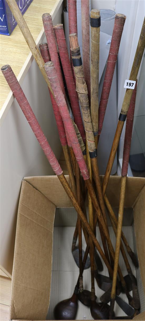 14 Vintage gold clubs